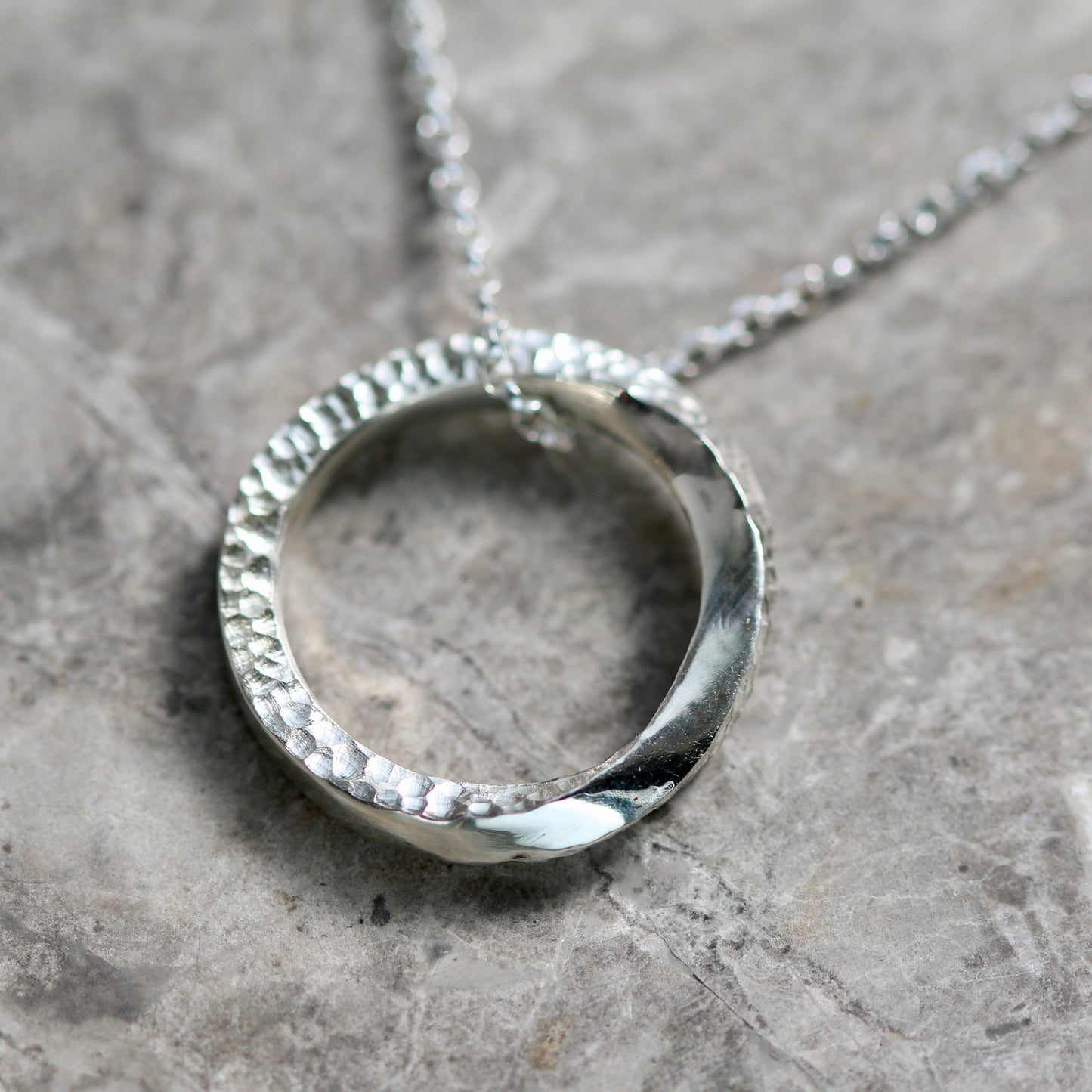 Silver Textured Möbius Twist Halo Ring Pendant image 1