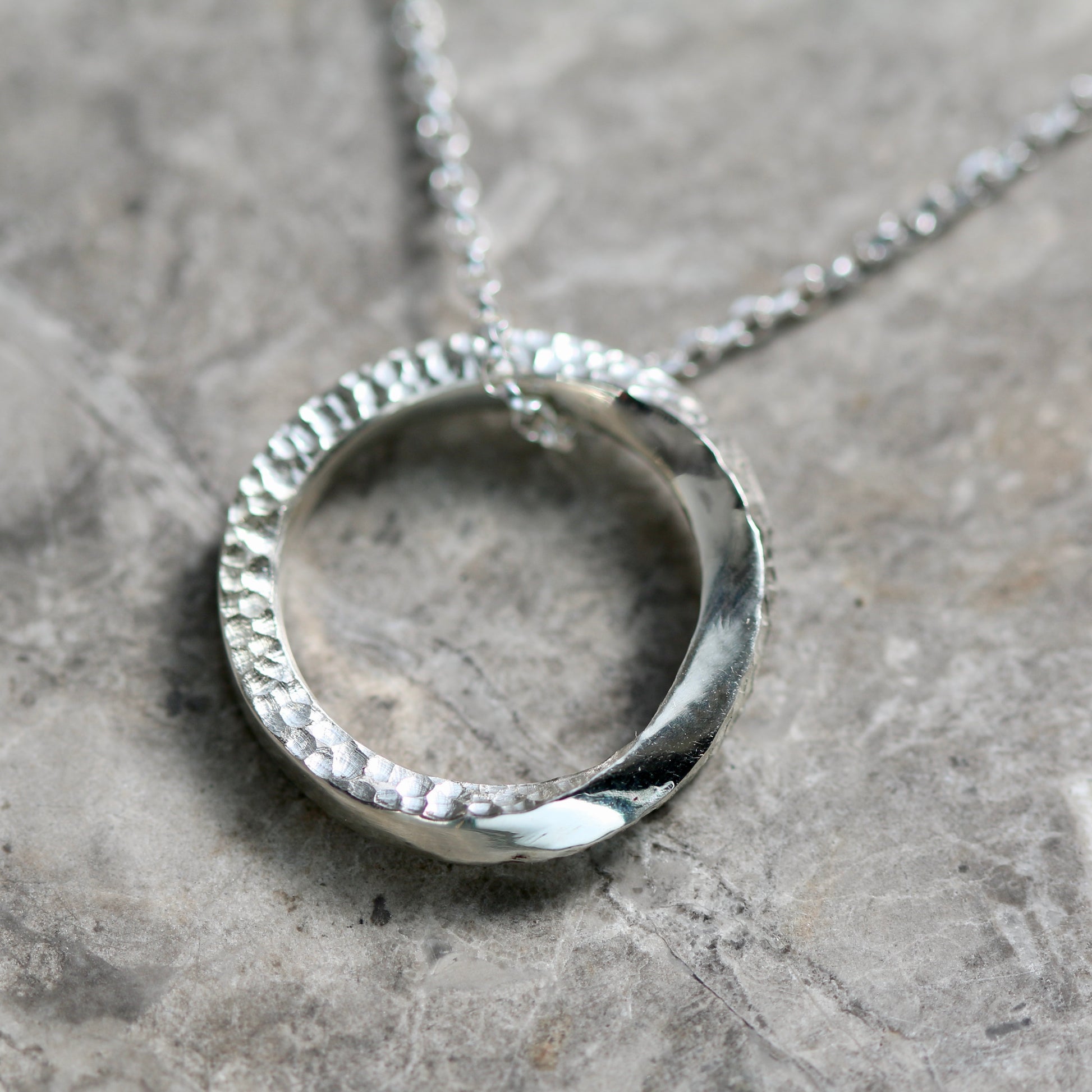 Silver Textured Möbius Twist Halo Ring Pendant image 1